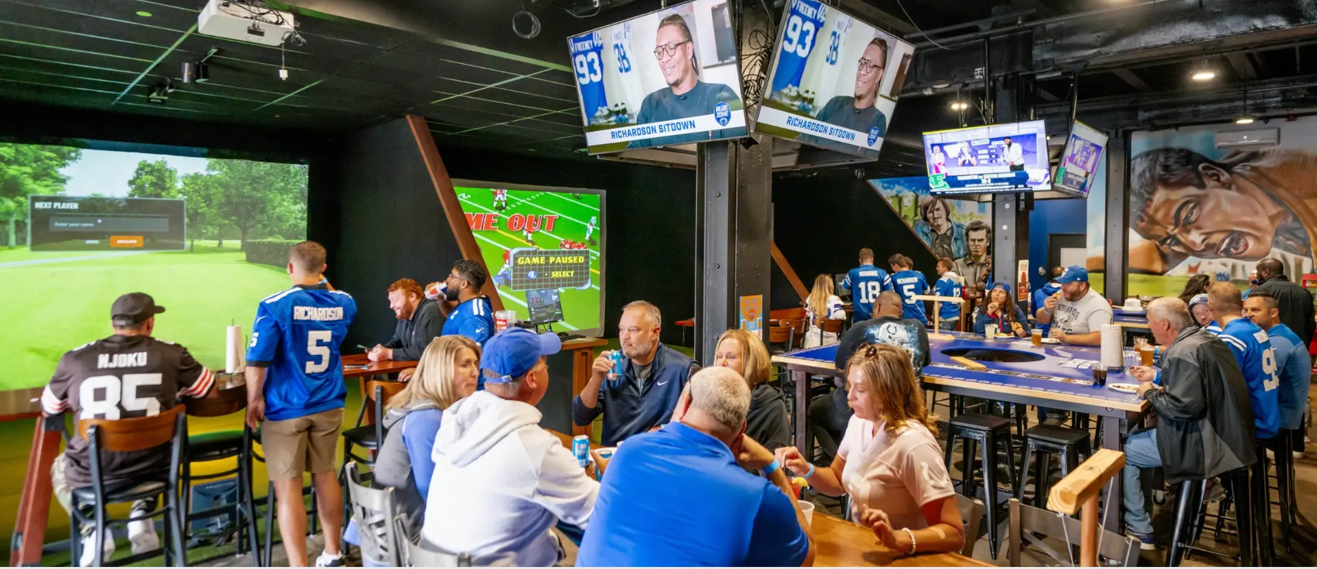 The Hangar filled with Colts fans watching games and tailgating